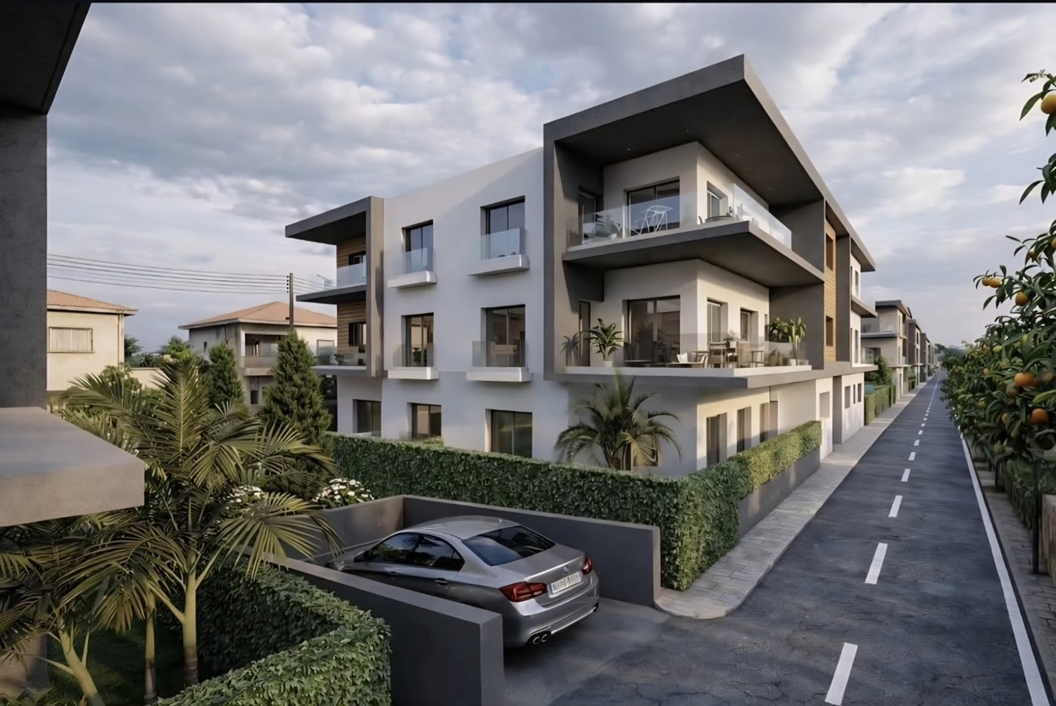 Immeuble résidentiel contemporain avec stationnement paysager
